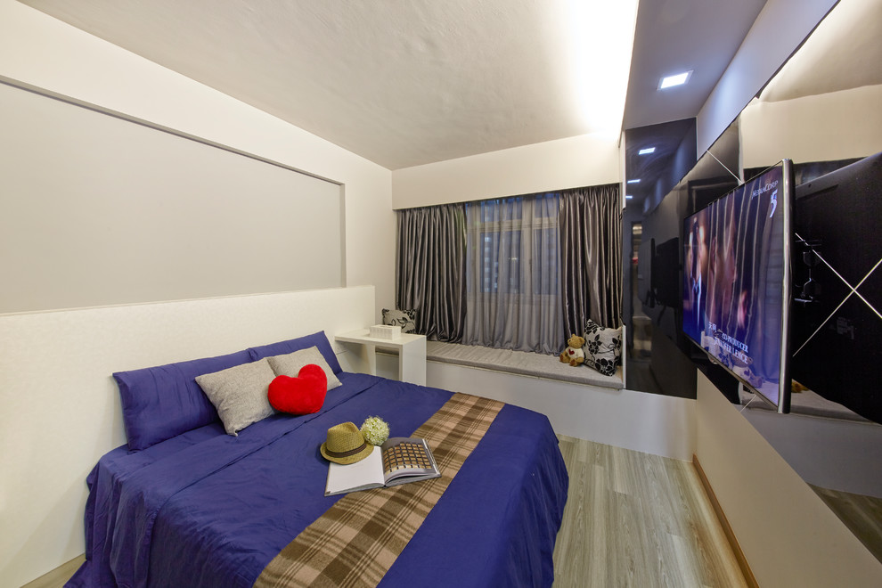 Modelo de dormitorio principal minimalista pequeño sin chimenea con paredes grises y suelo vinílico