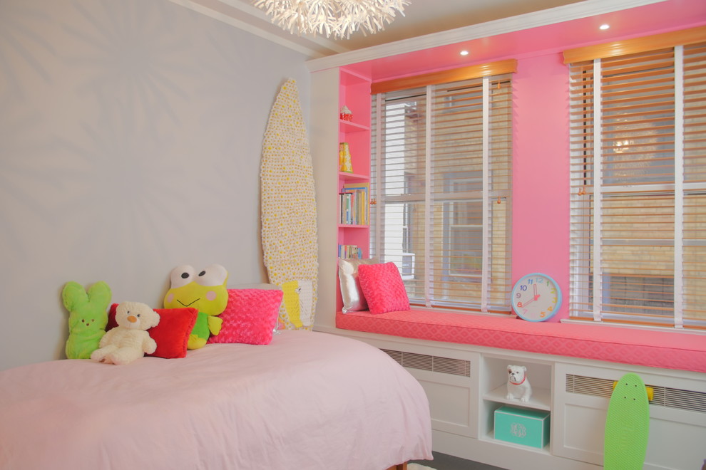 Design ideas for a small beach style bedroom in New York with pink walls.