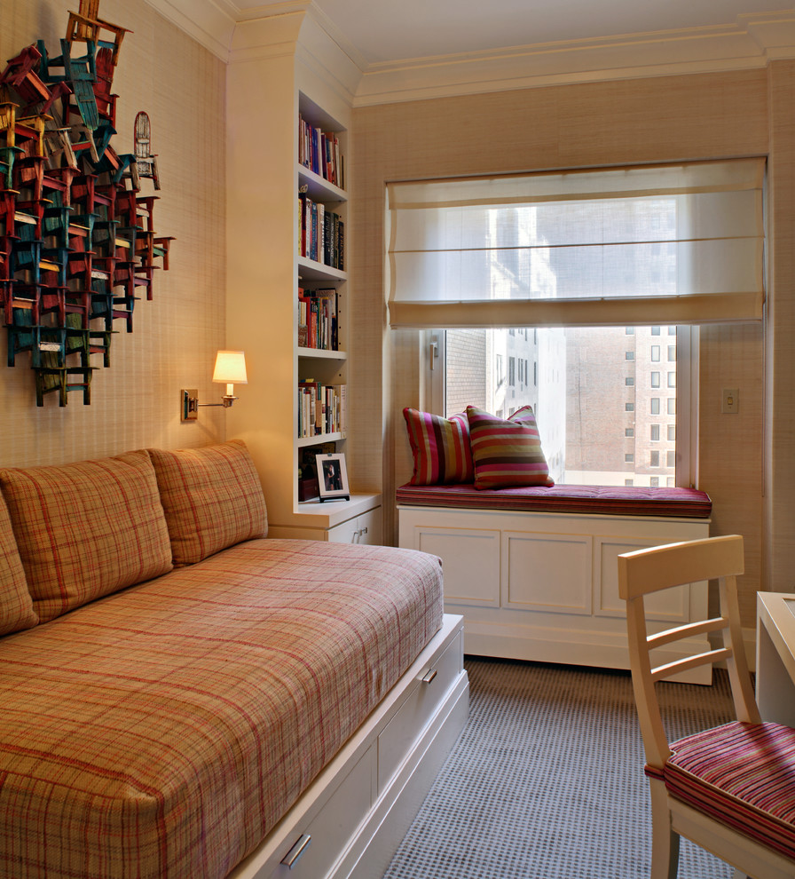 Design ideas for a small traditional guest bedroom in New York with beige walls and carpet.