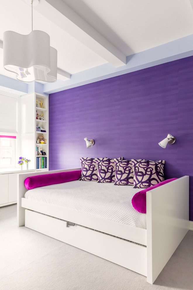 Inspiration for a traditional bedroom in New York with purple walls and carpet.