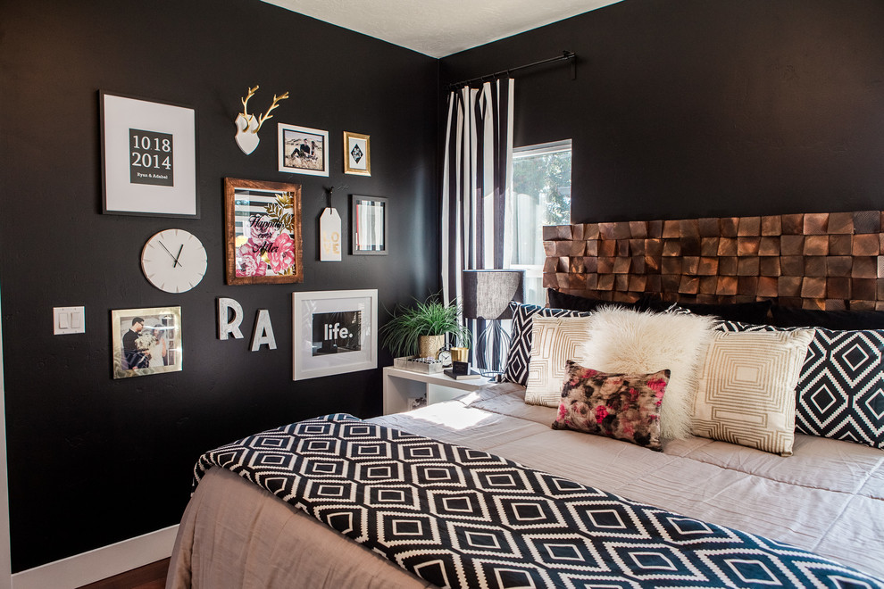 Bedroom - mid-sized modern master dark wood floor bedroom idea in Boise with black walls