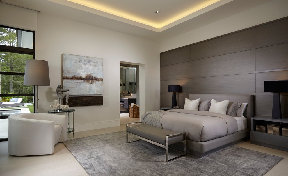 Contemporary master bedroom in Miami with white walls.