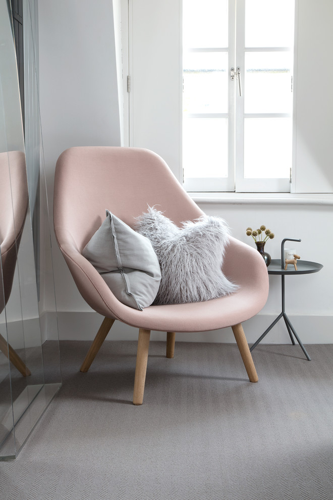 Design ideas for a medium sized scandi grey and pink bedroom in London.