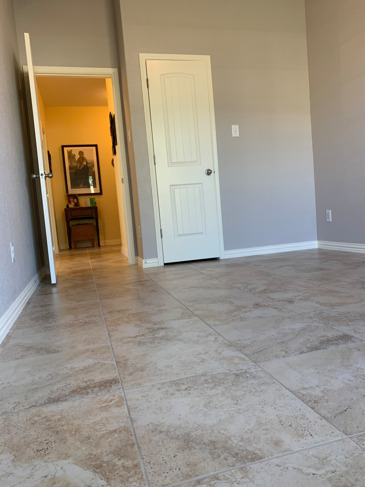 Foto de habitación de invitados contemporánea de tamaño medio con suelo de baldosas de cerámica, suelo multicolor y paredes grises