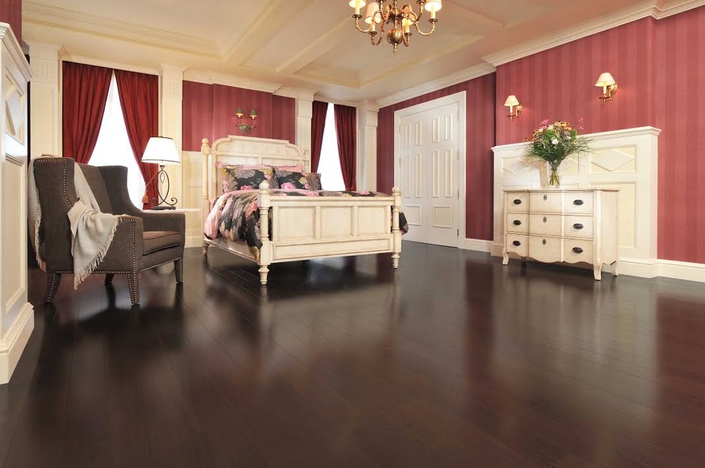 Photo of a large victorian master and grey and brown bedroom in Miami with pink walls and dark hardwood flooring.
