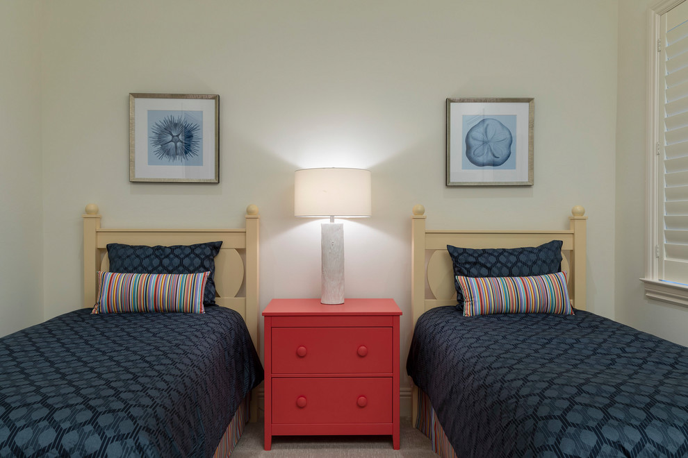 This is an example of a small coastal guest bedroom in Other with carpet, grey floors and white walls.