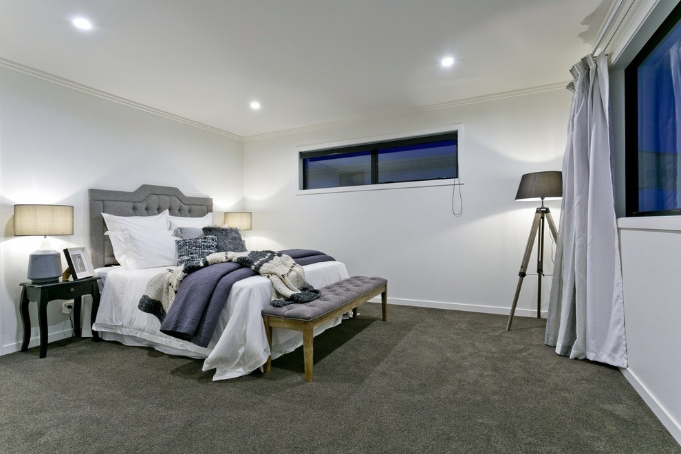 Exemple d'une chambre avec moquette chic avec un mur blanc et un sol gris.
