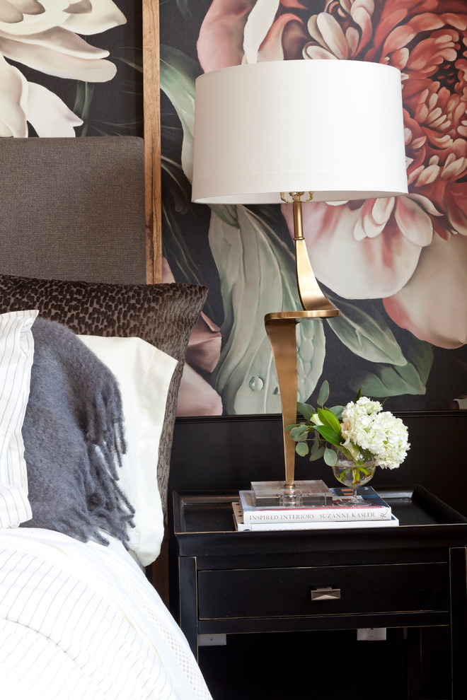 Example of a transitional bedroom design in Denver