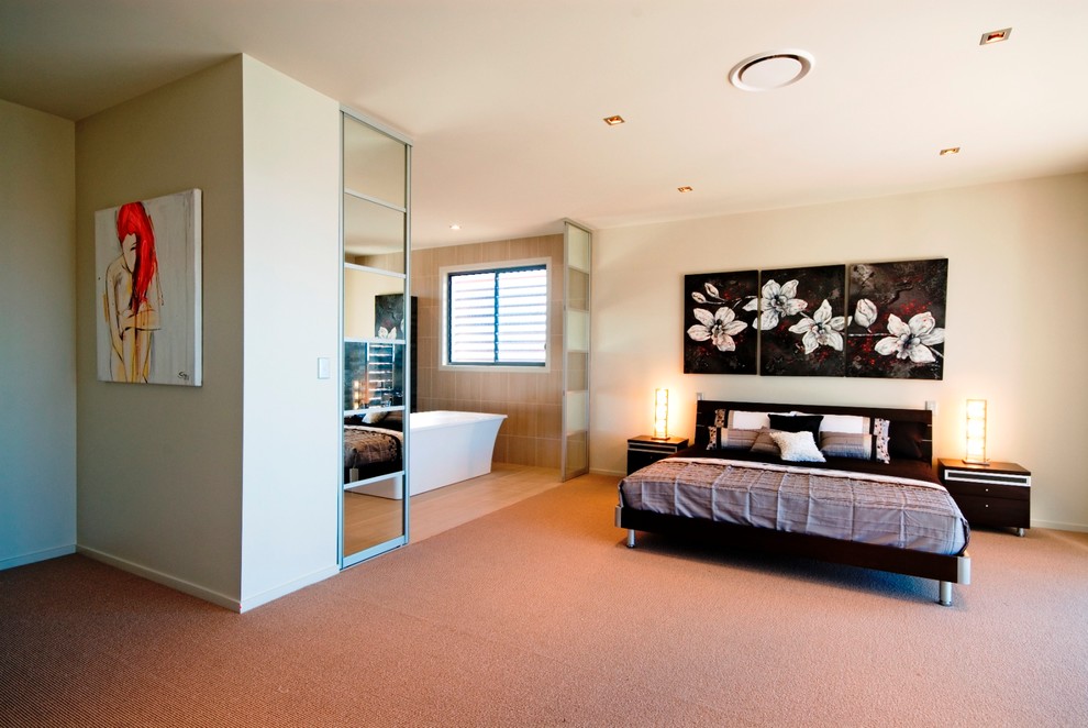 Example of a trendy bedroom design in Brisbane