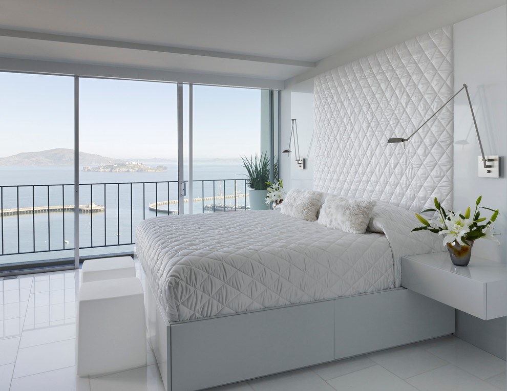 Photo of a contemporary bedroom in San Francisco with white walls, no fireplace, ceramic flooring and white floors.