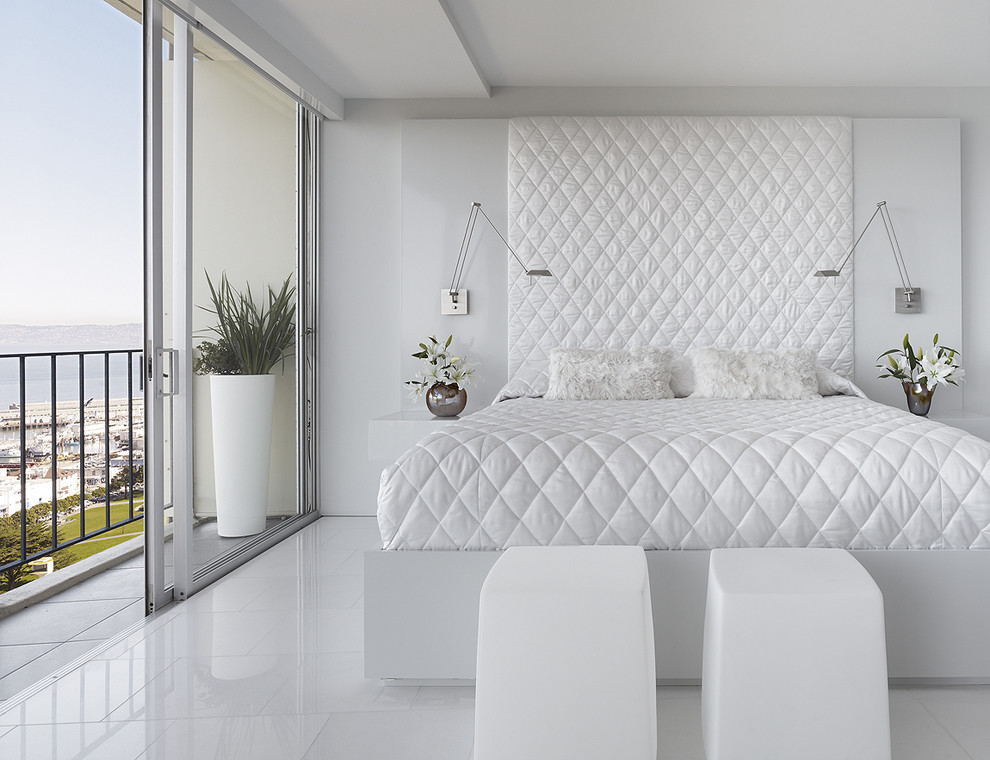 Bedroom - modern marble floor and white floor bedroom idea in San Francisco with white walls