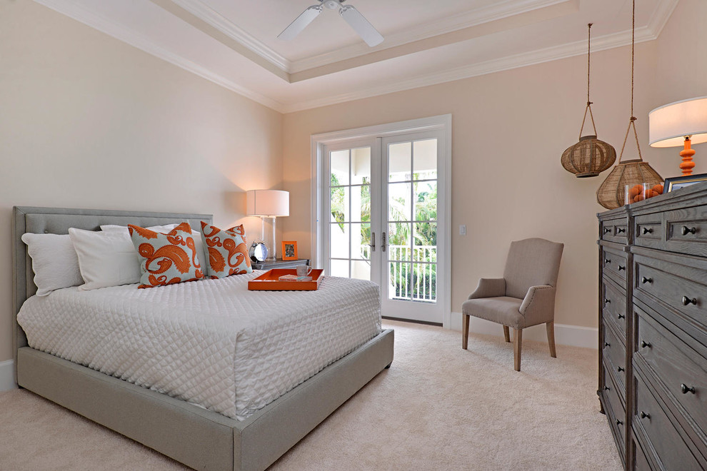 Inspiration for a transitional carpeted and beige floor bedroom remodel in Miami with beige walls
