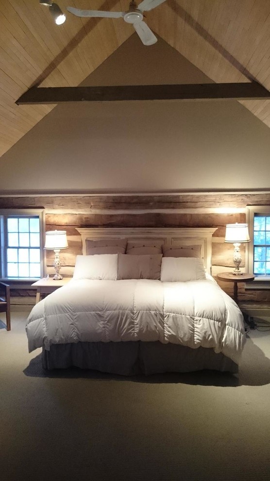 Bedroom - huge rustic master carpeted bedroom idea in Toronto with gray walls
