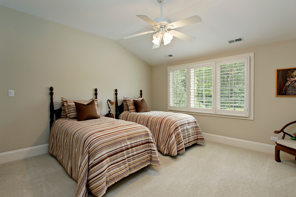 This is an example of a classic bedroom in Denver with carpet.