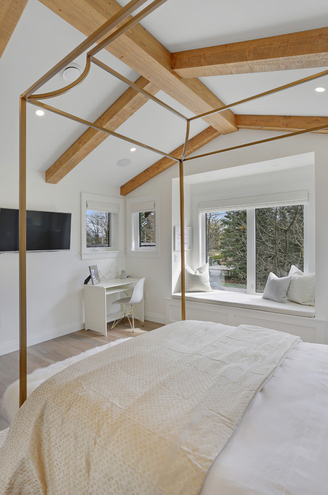 Large contemporary guest bedroom in Vancouver with white walls, medium hardwood flooring, no fireplace and brown floors.