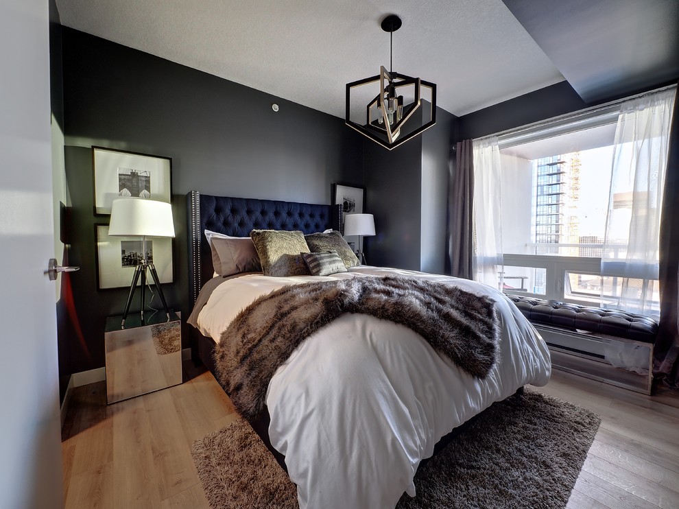 Inspiration for a small contemporary master bedroom in Edmonton with blue walls, vinyl flooring and no fireplace.