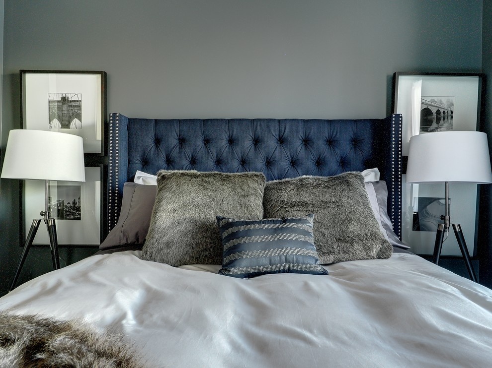 Inspiration for a small contemporary master bedroom remodel in Edmonton with blue walls and no fireplace