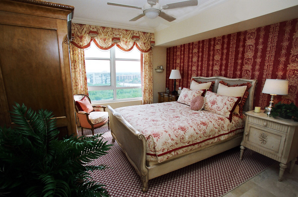Medium sized rural master bedroom in Atlanta with red walls, limestone flooring, no fireplace and beige floors.