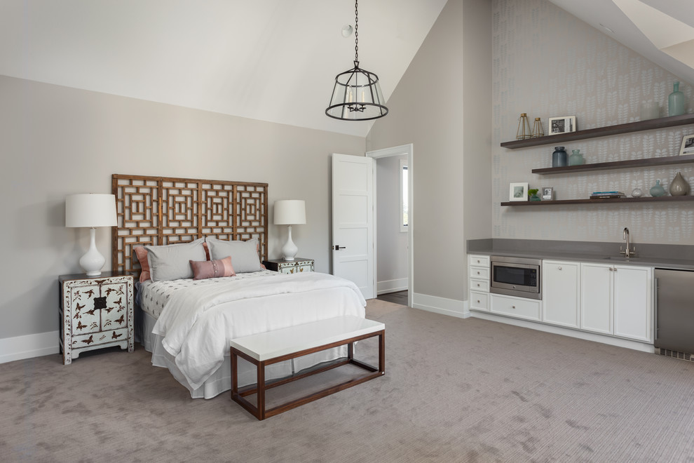 Design ideas for an expansive traditional guest bedroom in Portland with grey walls and carpet.