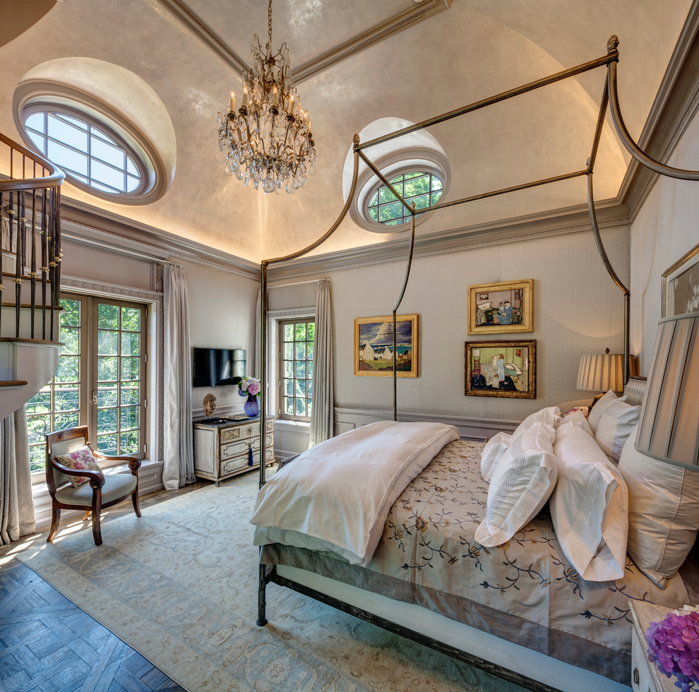 Elegant master dark wood floor bedroom photo in New York with gray walls