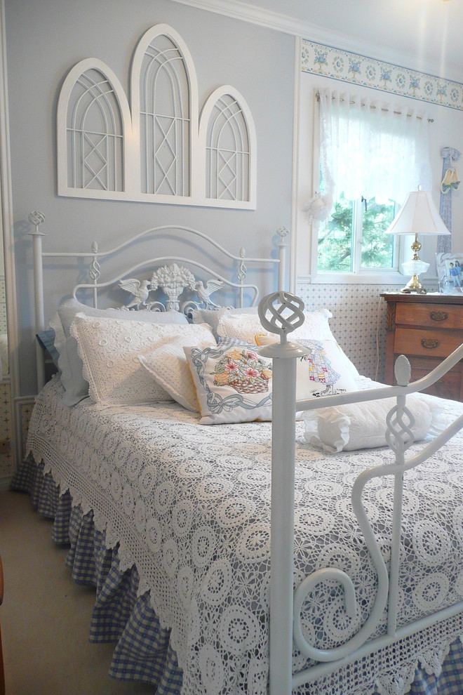 Bedroom - traditional bedroom idea in Vancouver with blue walls and no fireplace