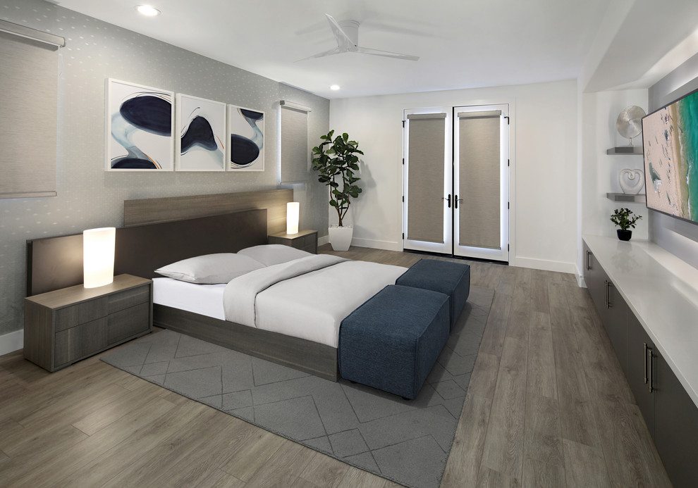 Mittelgroßes Modernes Hauptschlafzimmer mit grauer Wandfarbe, grauem Boden und Vinylboden in Orange County