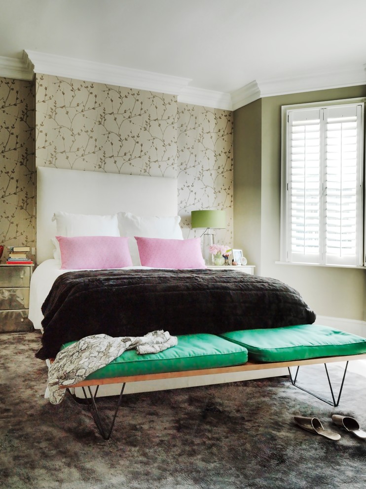 Contemporary bedroom in London with multi-coloured walls and carpet.