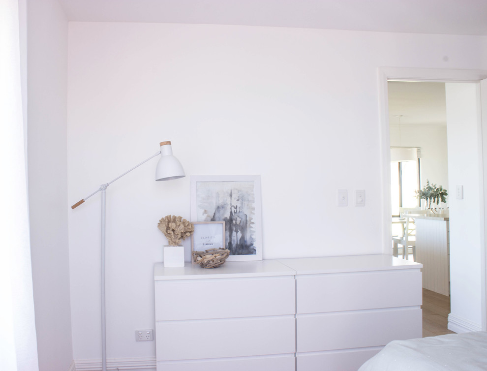 Bedroom - mid-sized coastal master light wood floor bedroom idea in Perth with gray walls