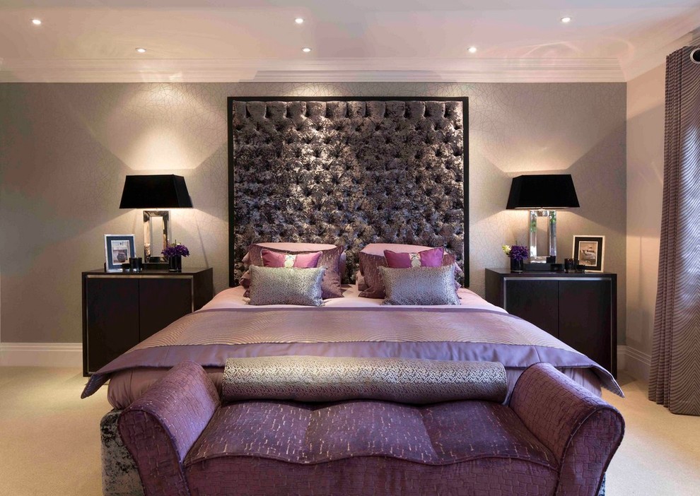 Traditional grey and silver bedroom in London with beige walls and carpet.