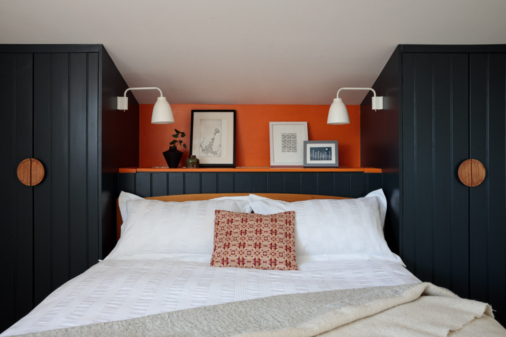 Example of a mid-century modern bedroom design in Hertfordshire