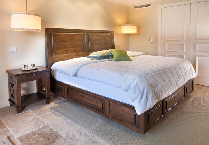 Inspiration for a medium sized traditional guest bedroom in Miami with travertine flooring, beige walls and beige floors.