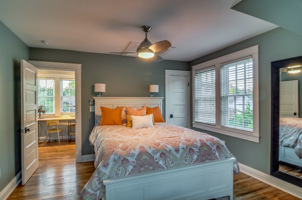 Inspiration for a small craftsman guest medium tone wood floor bedroom remodel in Nashville with gray walls