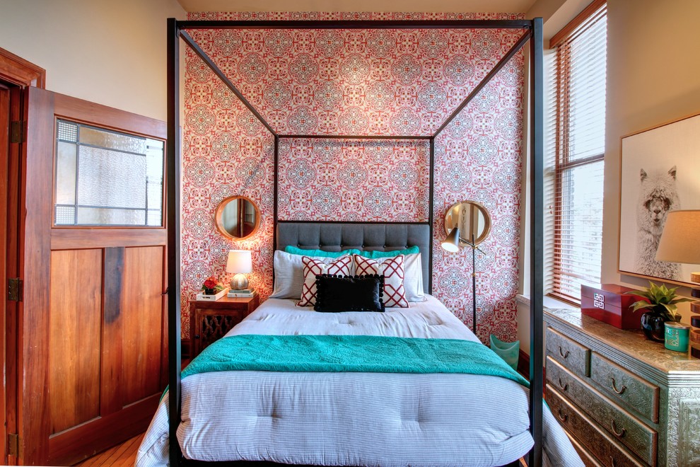 Example of a transitional bedroom design in Chicago