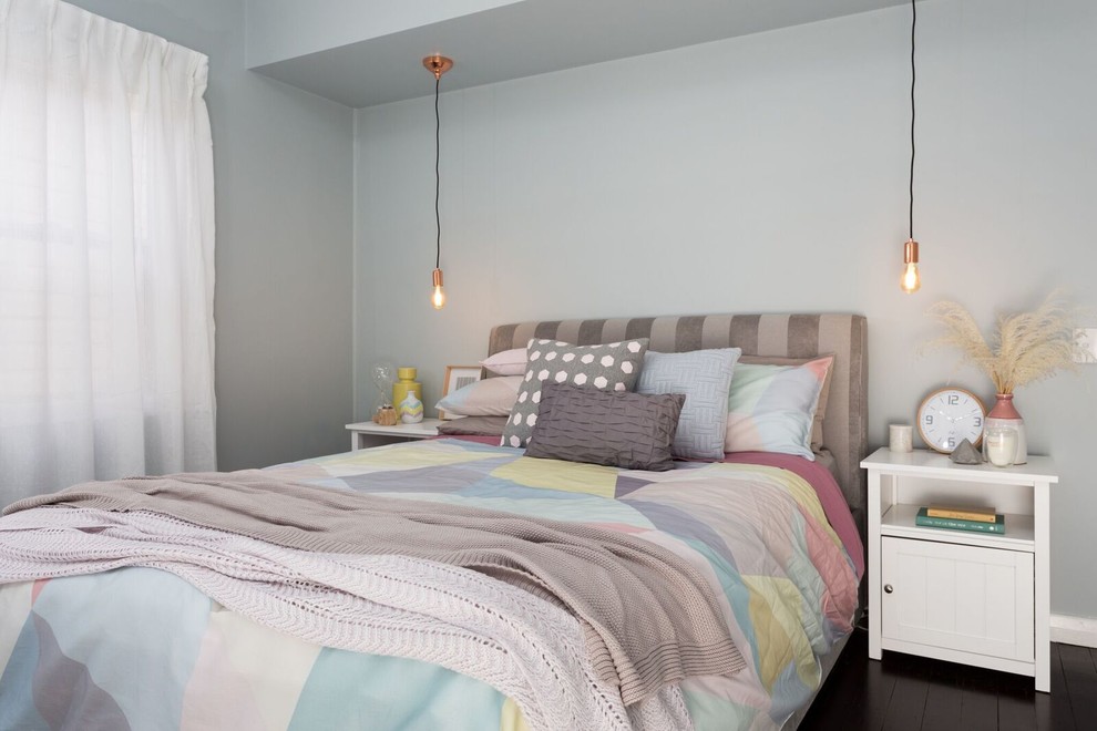 Medium sized classic master bedroom in Newcastle - Maitland with grey walls and dark hardwood flooring.