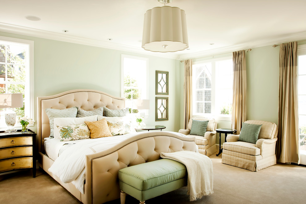 Elegant bedroom photo in Portland with green walls