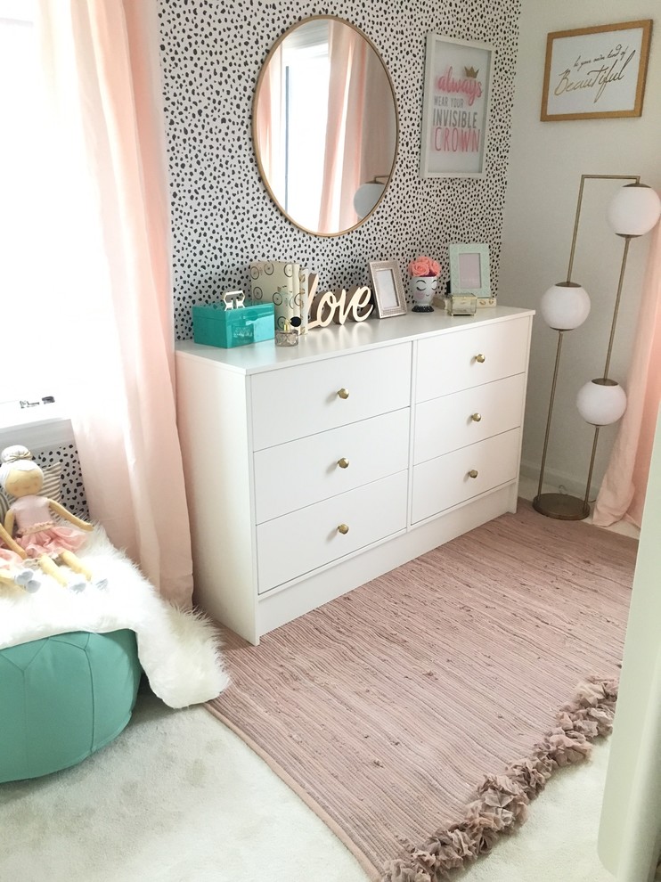 Example of a mid-sized trendy guest carpeted and beige floor bedroom design in New York with white walls
