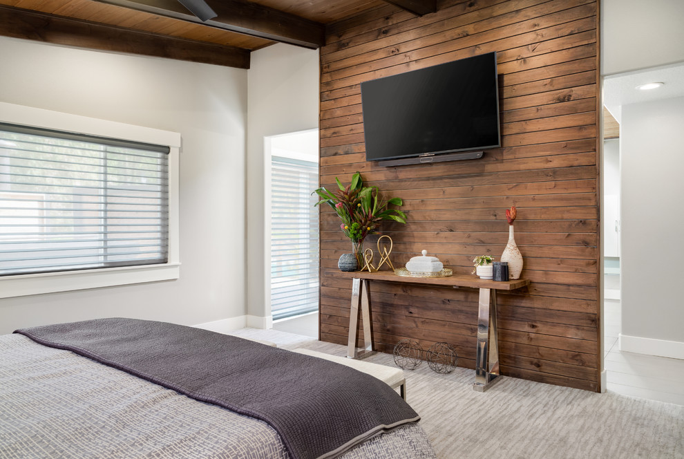 Modelo de dormitorio principal vintage de tamaño medio sin chimenea con paredes grises, moqueta y suelo gris