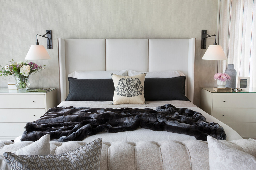 Photo of a large classic master and cream and black bedroom in Other with beige walls.