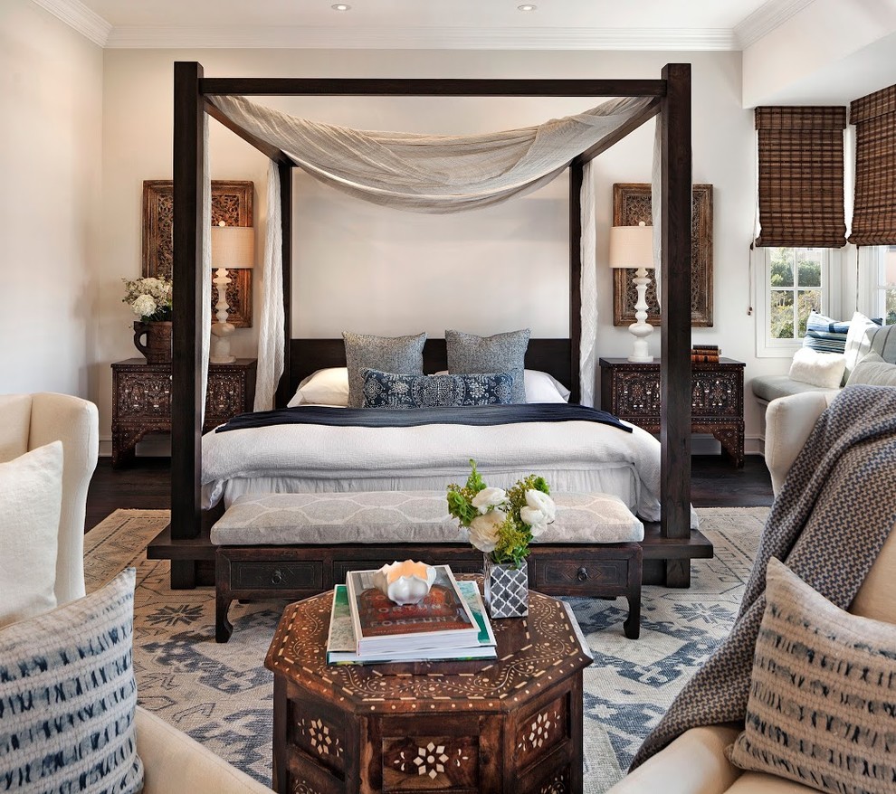 Inspiration for a large transitional master medium tone wood floor and brown floor bedroom remodel in Los Angeles with beige walls and no fireplace