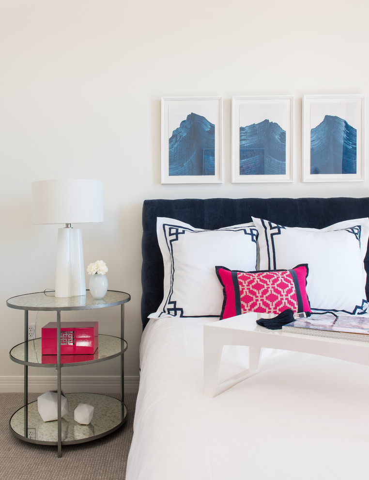 Inspiration for a mid-sized transitional guest carpeted bedroom remodel in Dallas with beige walls