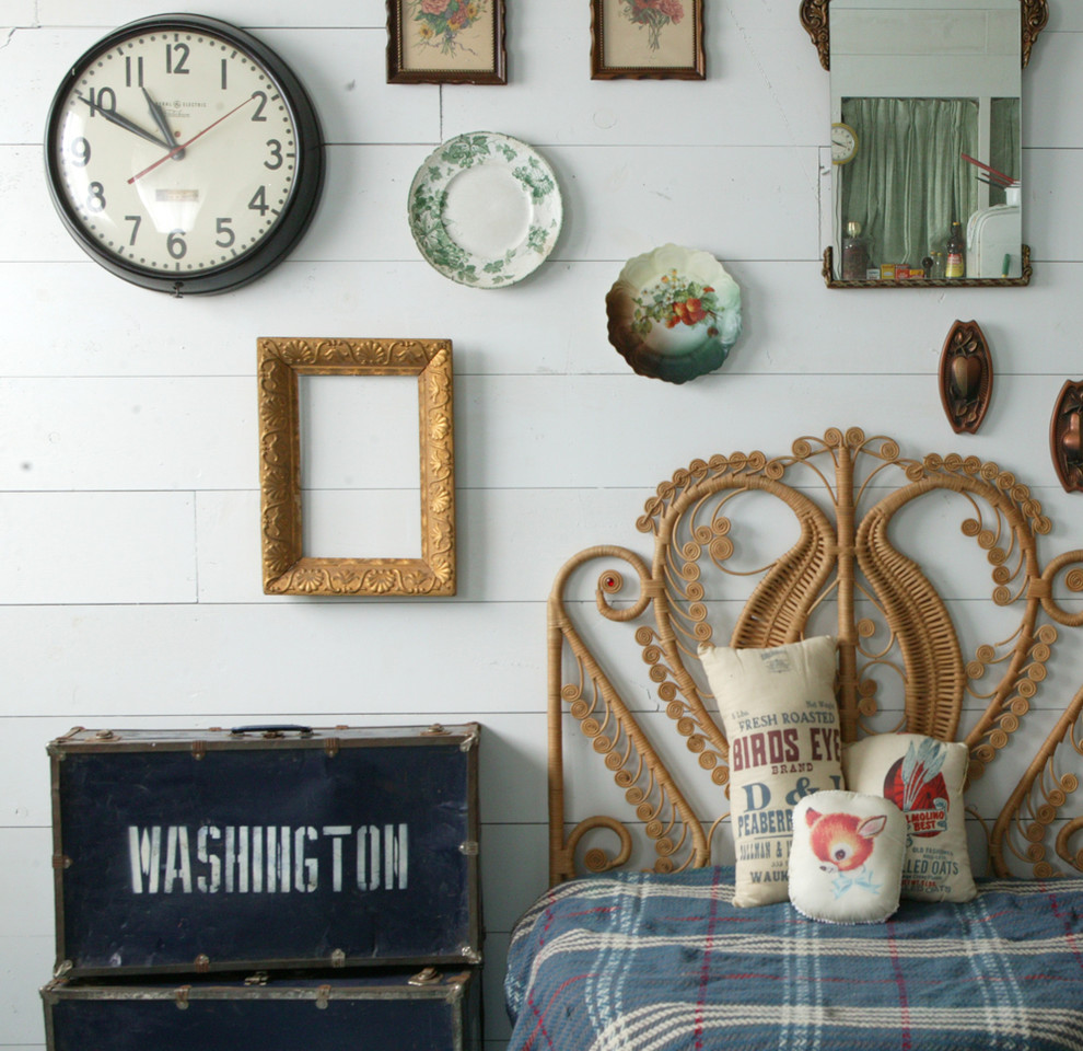 Design ideas for a vintage bedroom in Omaha with white walls.