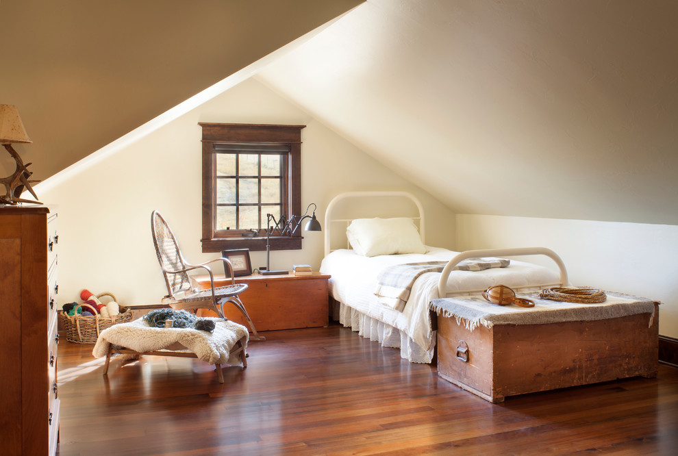 Mountain style loft-style dark wood floor bedroom photo in Other