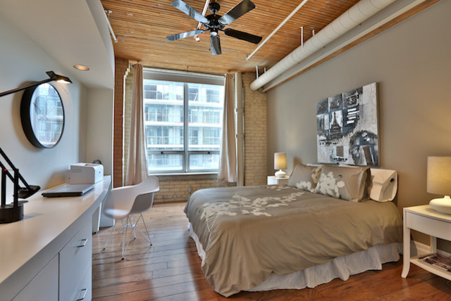 Bedroom - industrial bedroom idea in Toronto