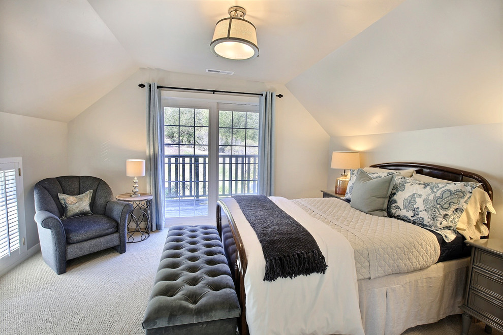 Large classic guest bedroom in San Francisco with medium hardwood flooring, grey walls, no fireplace and grey floors.