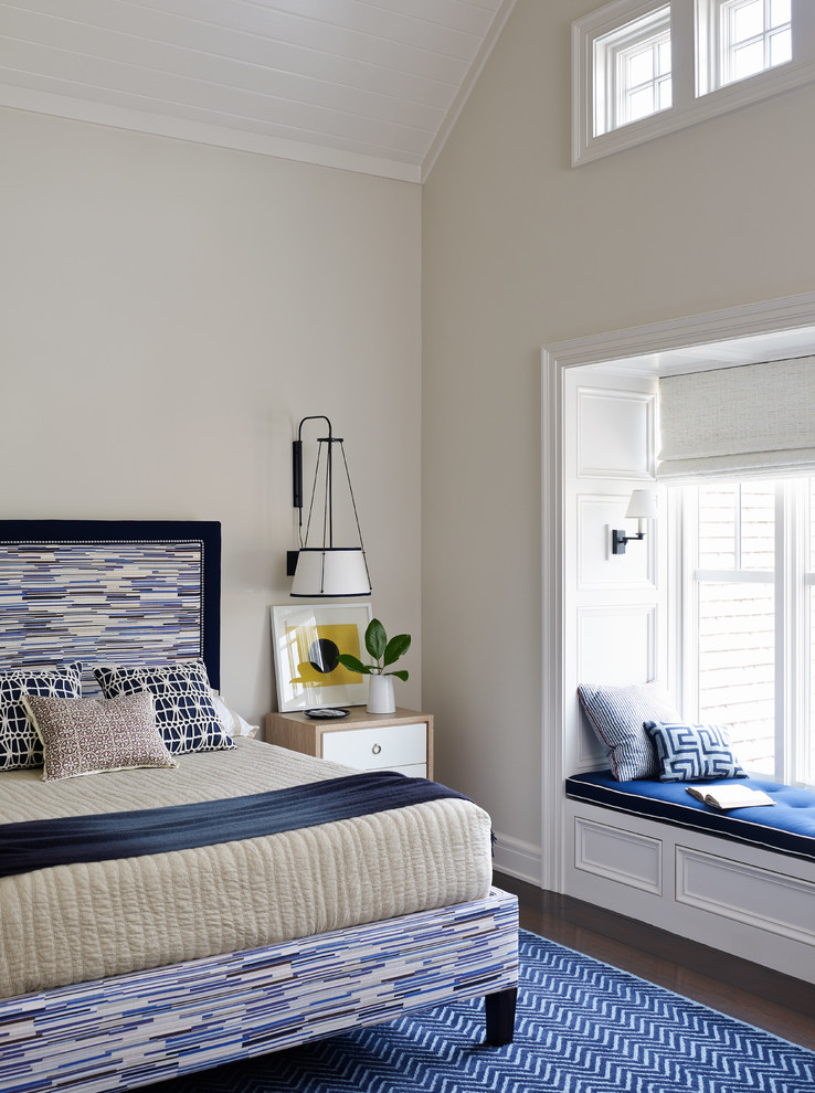 Inspiration for a coastal bedroom in Jacksonville with beige walls.
