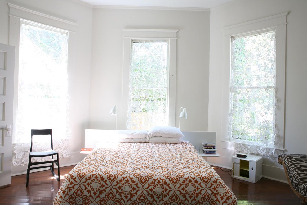 Trendy bedroom photo in New York with white walls