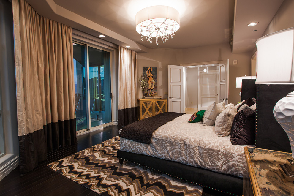 Photo of a large classic master bedroom in Las Vegas with dark hardwood flooring.