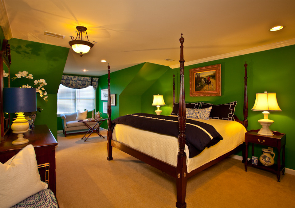 Photo of a large traditional guest bedroom in Raleigh with green walls and carpet.