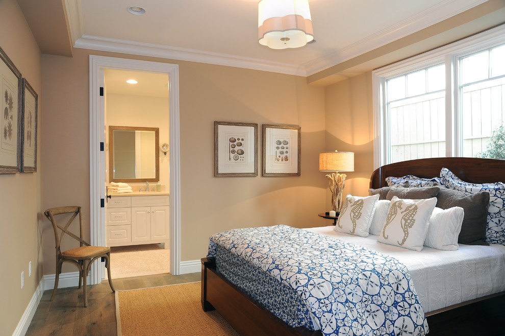 Nautical bedroom in Los Angeles with beige walls and feature lighting.