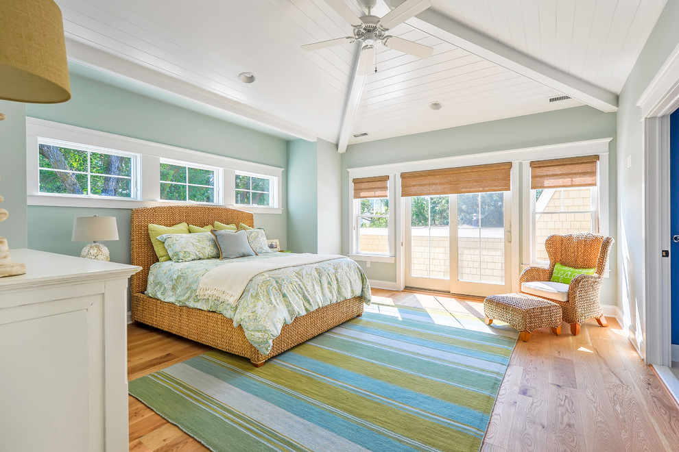 Inspiration for a beach style bedroom in Philadelphia with grey walls and medium hardwood flooring.